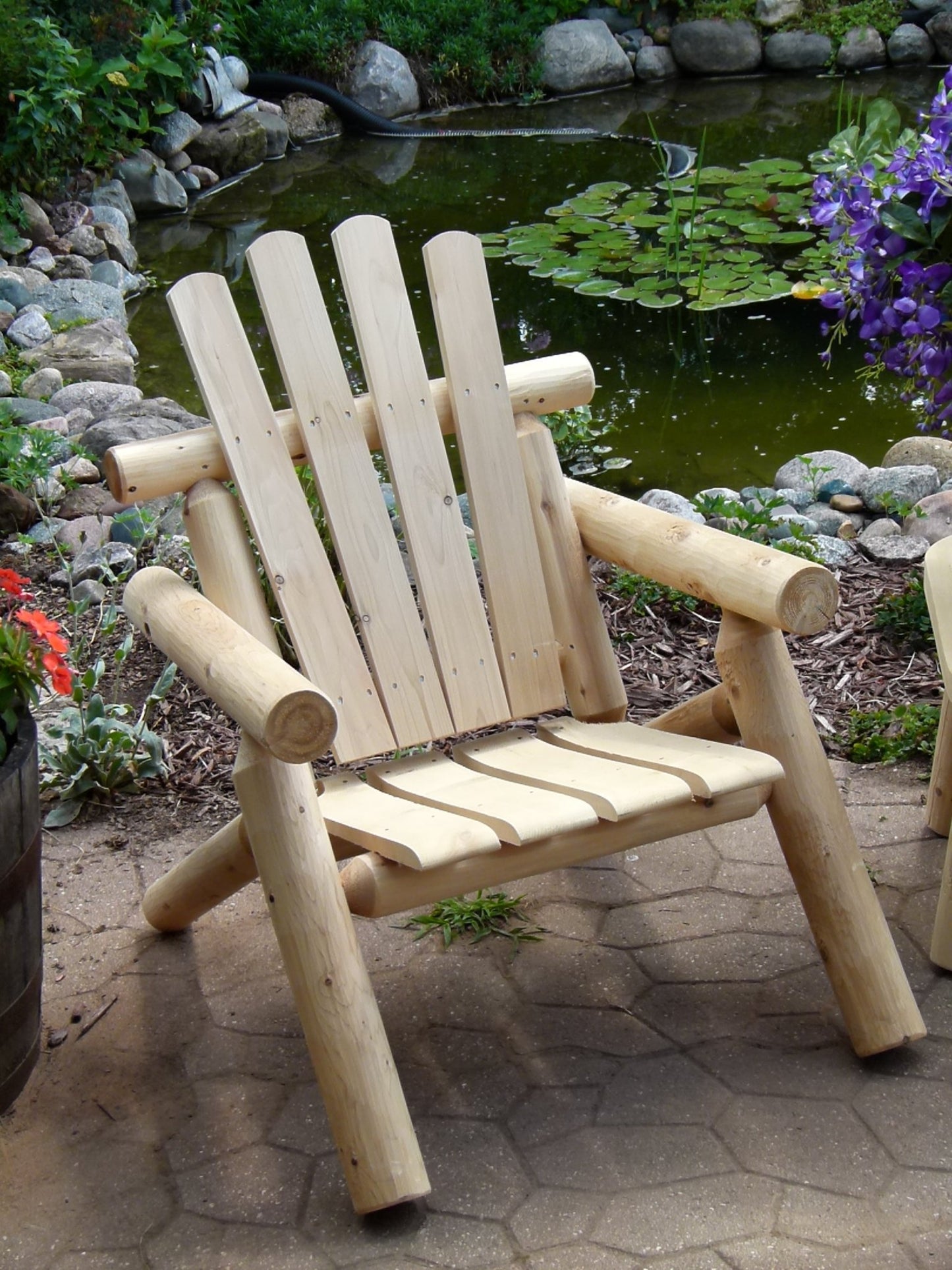 Handcrafted log chair with a rustic design, perfect for outdoor relaxation and garden seating.
