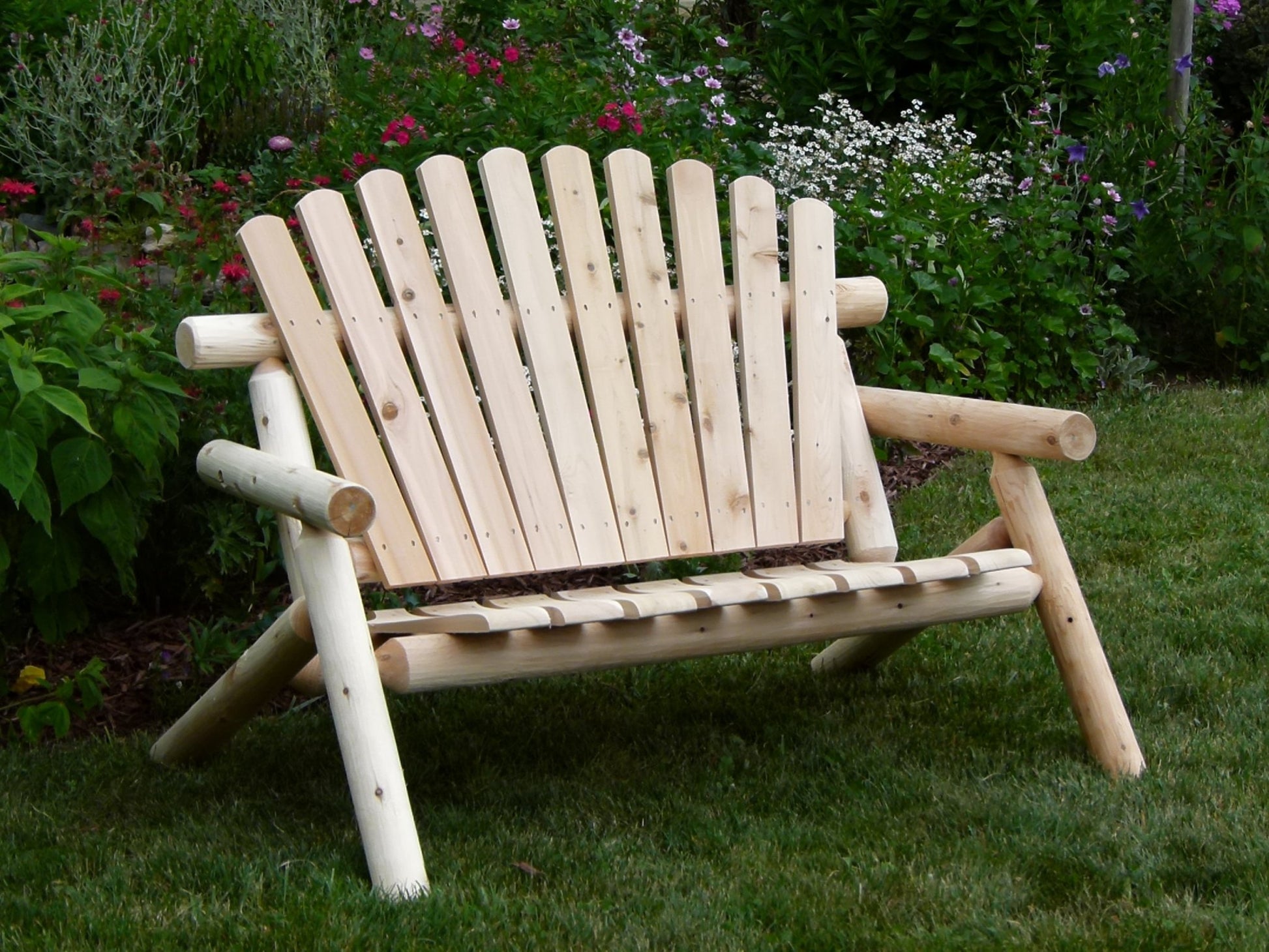 Durable Wooden Bench with a sturdy log frame, perfect for outdoor seating and relaxation.