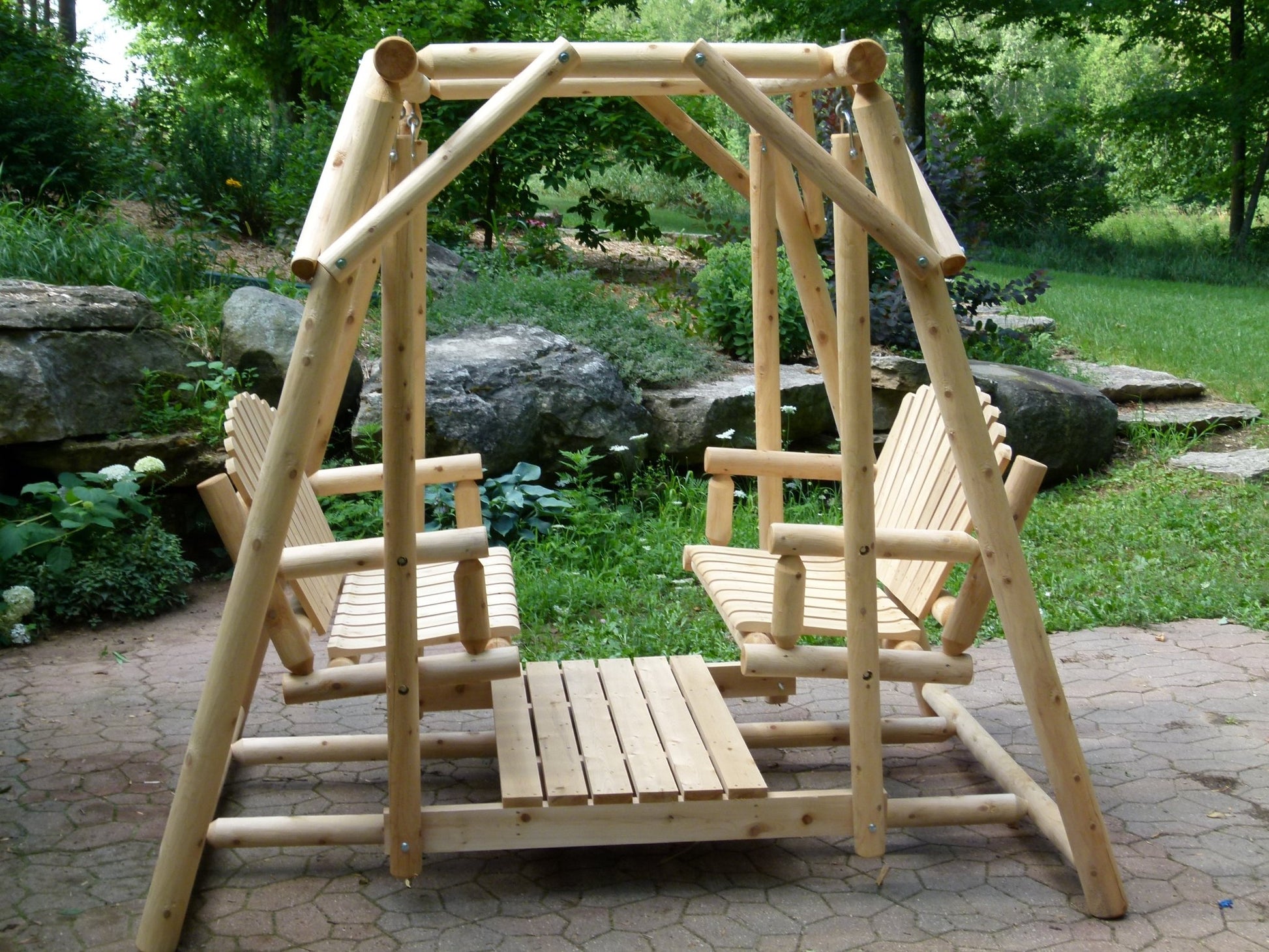 Handcrafted double bench swing, perfect for relaxing outdoors with a natural wood aesthetic