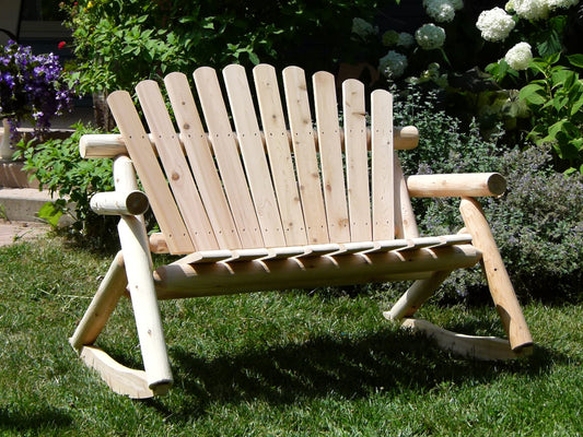 Handcrafted rocking wooden bench perfect for outdoor relaxation on a patio or garden