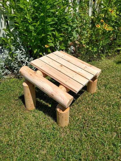 Patio foot rest with a handcrafted log design, perfect for outdoor relaxation.