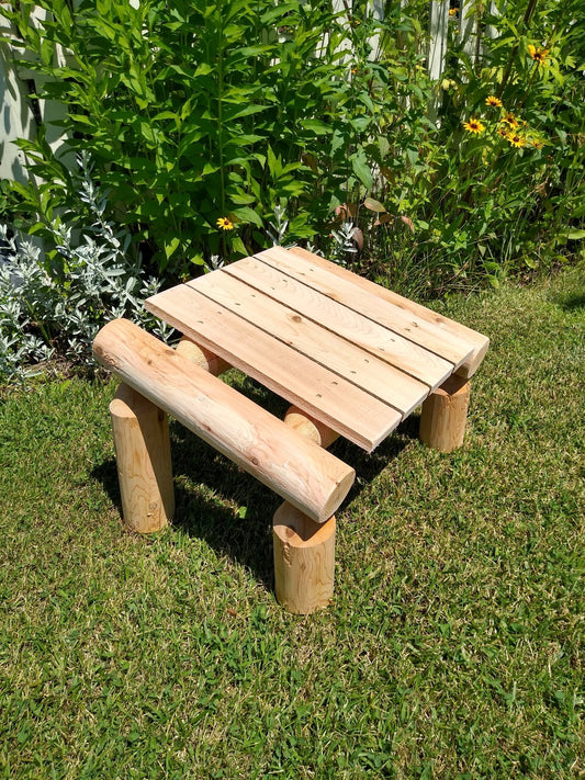 Patio foot rest with a handcrafted log design, perfect for outdoor relaxation.
