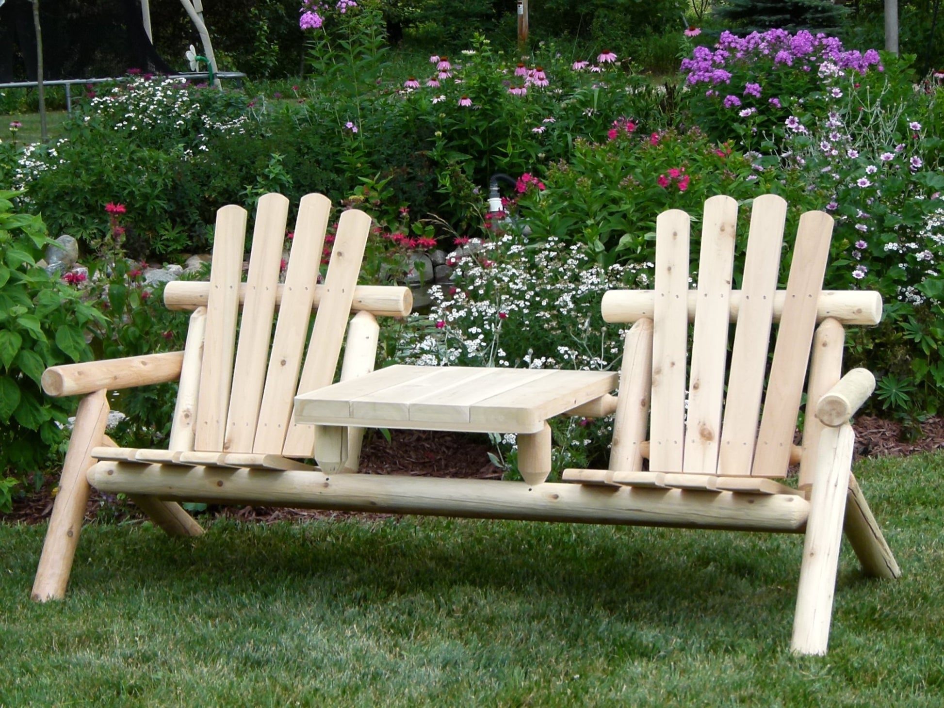 Handmade wooden chair set with a built-in table, perfect for outdoor relaxation and gatherings.